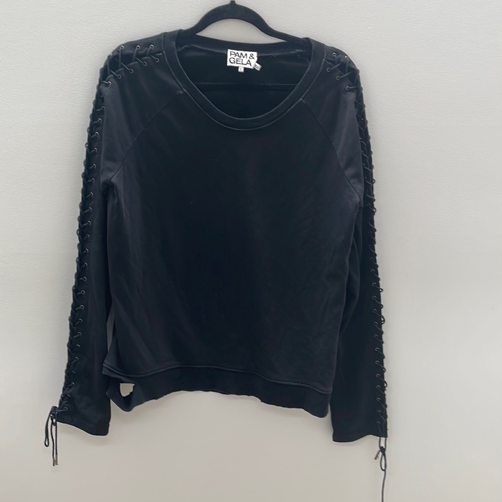 Pam & Gela lace arm distressed black sweatshirt.
